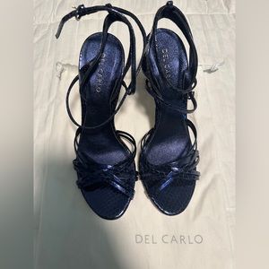 Navy Del Carlo heels. Only wore in the store - purchased in France.